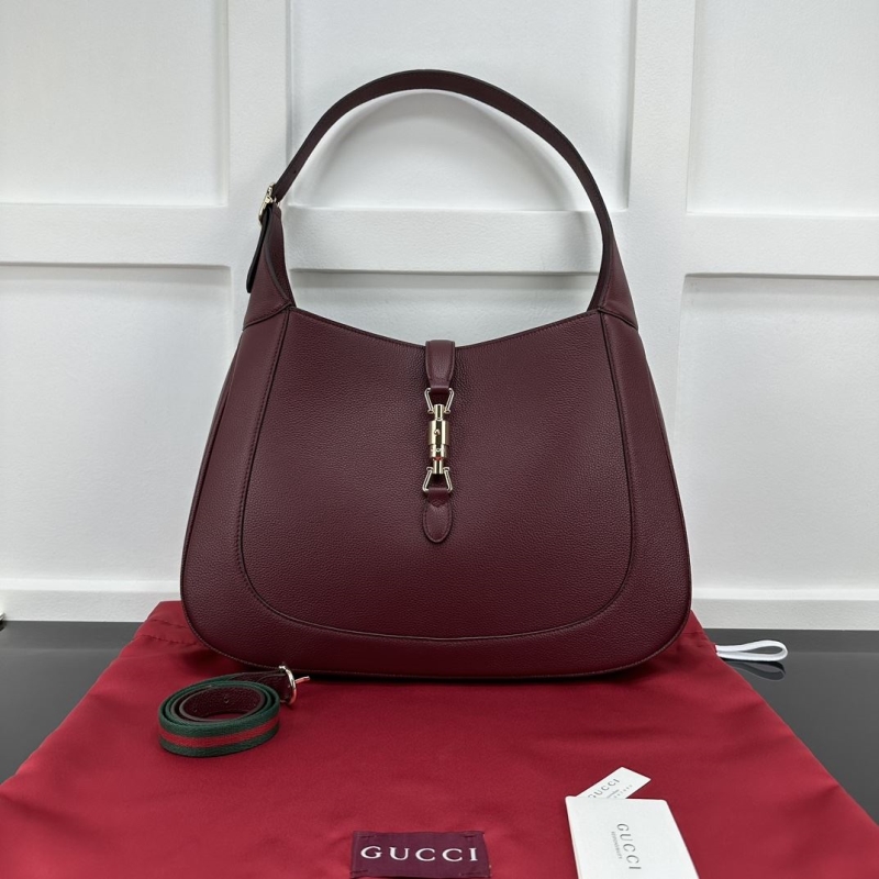 G*u*i top handle bags